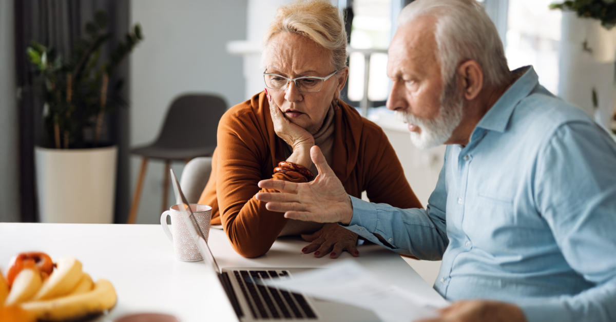 Frustrated senior using pc