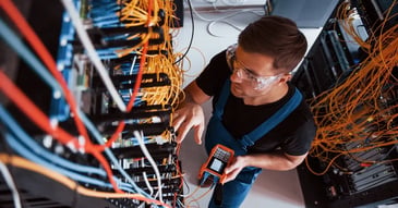 Technician working with internet equipment
