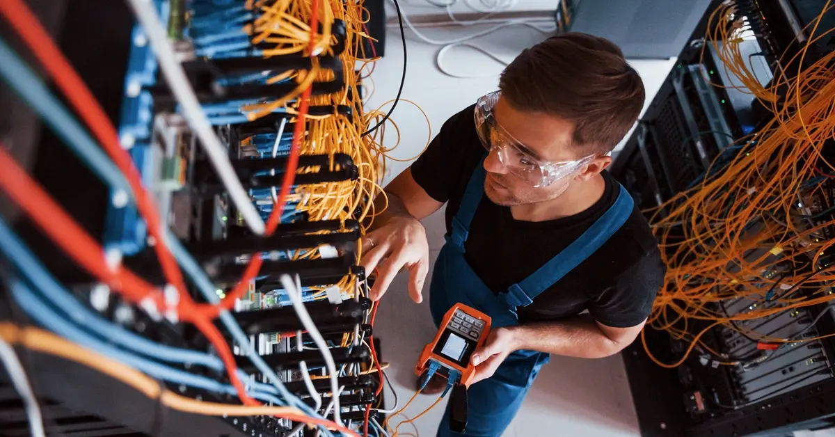 Technician working with internet equipment